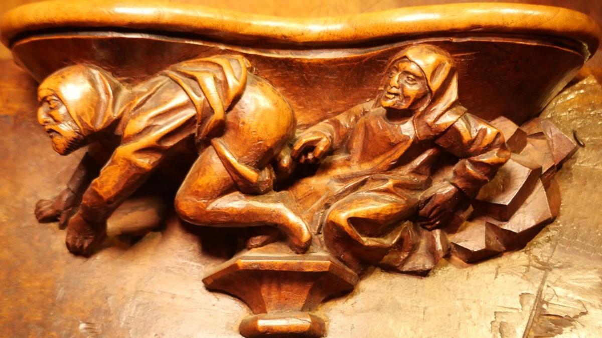Misericordia del Coro de la Catedral de Zamora: un monje trata a otro para reducir el deseo sexual